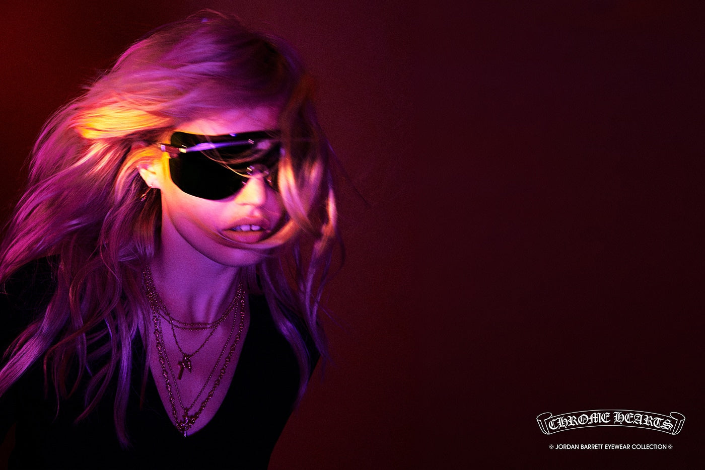Model wearing black Chrome Hearts sunglasses